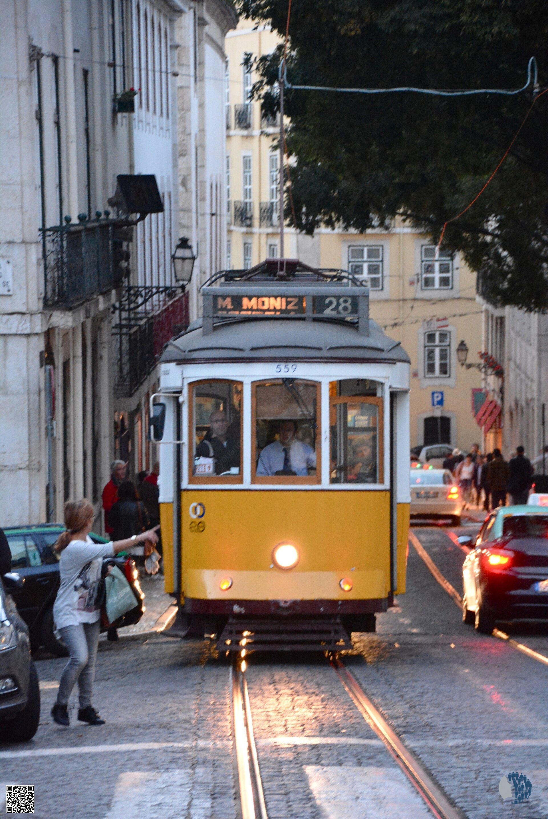 A Yellow Tram on the Tracks