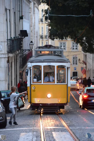 A Yellow Tram on the Tracks